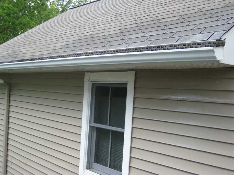 Outside of gutters after, Grime Busters Power Washing